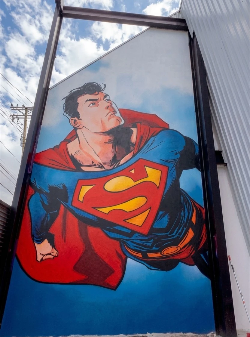 Massive Superman Mural Adorns Event Center Entrance in Pachuca, Mexico